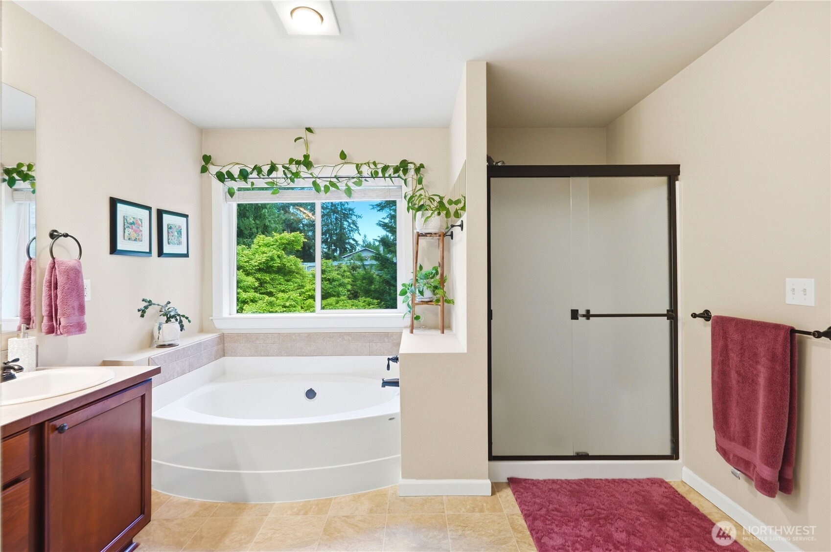 13410 Southeast 252nd Street Kent, WA 98042 - Photo 28 of 38 a bathroom with a bathtub and a shower