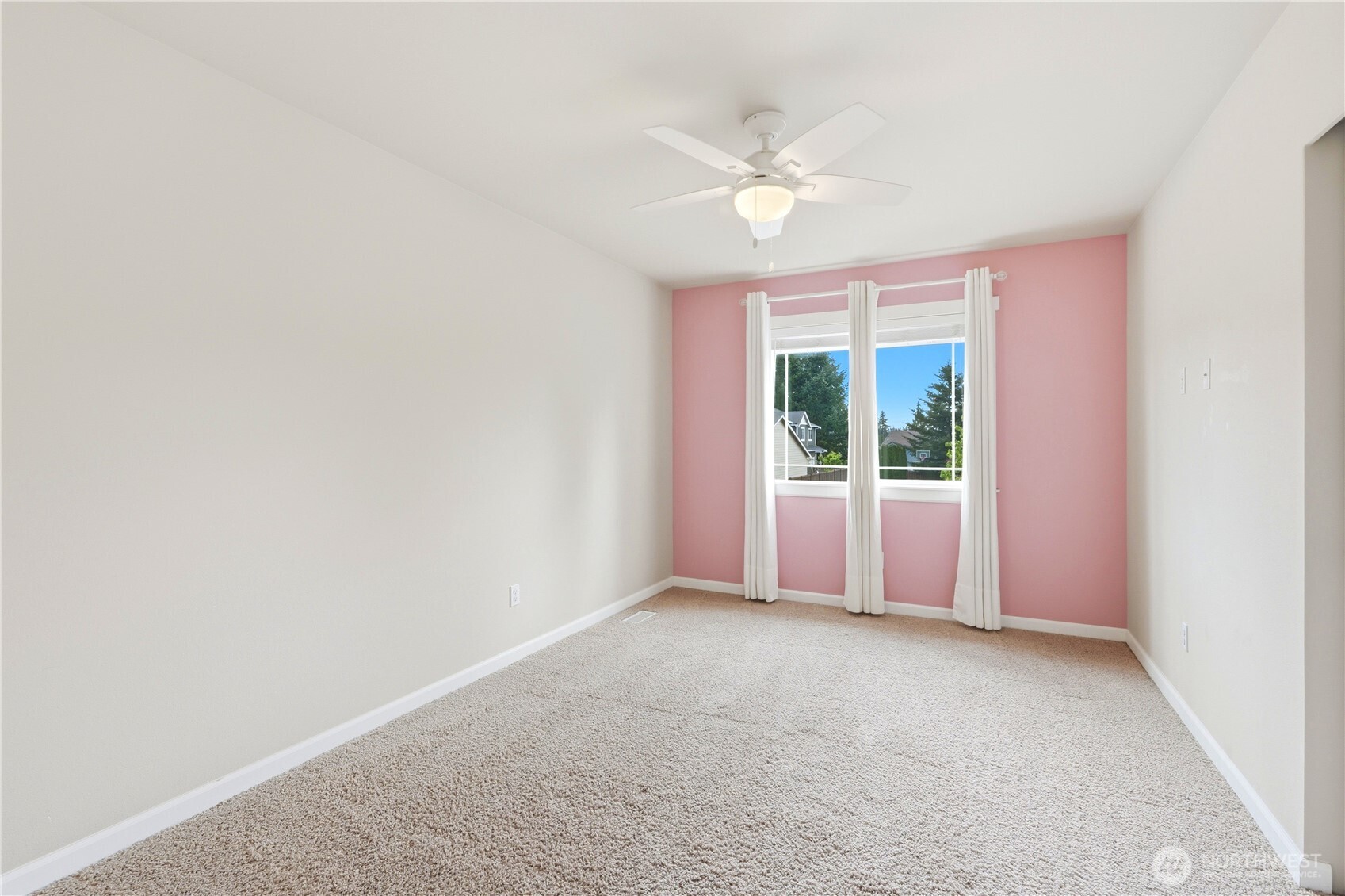 13410 Southeast 252nd Street Kent, WA 98042 - Photo 32 of 38 a view of an empty room with a window