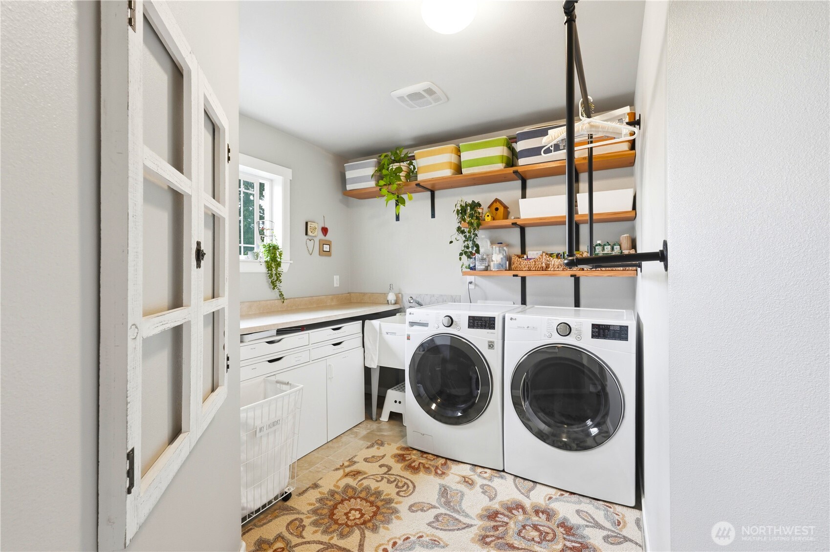 13410 Southeast 252nd Street Kent, WA 98042 - Photo 33 of 38 a view of a kitchen with washer and dryer