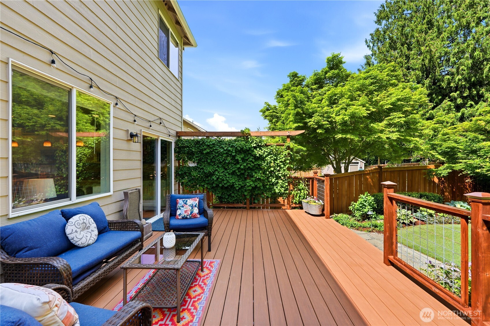 13410 Southeast 252nd Street Kent, WA 98042 - Photo 5 of 38 a view of balcony with wooden floor and outdoor seating