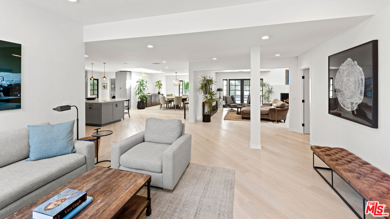 1944 North Beverly Drive Beverly Hills, CA 90210 - Photo 6 of 29 a living room with furniture and wooden floor