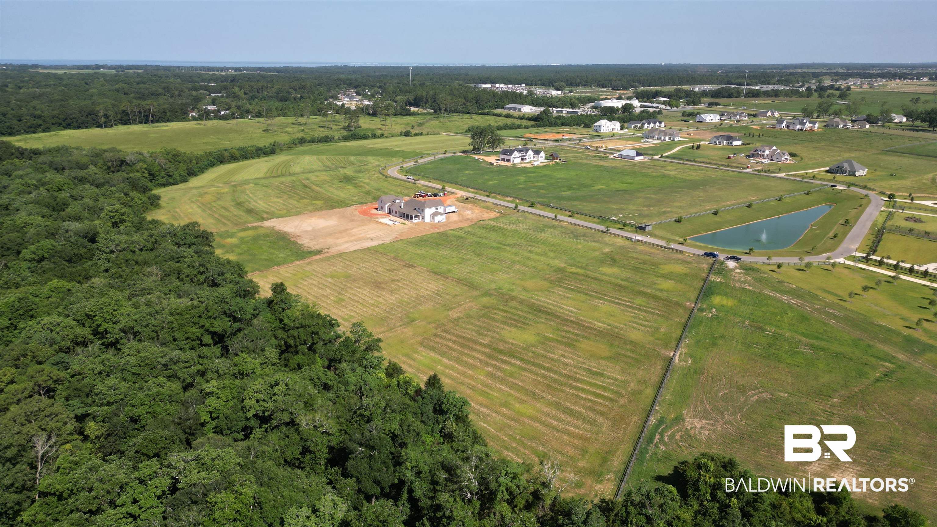 0 Gallery Boulevard Fairhope, AL 36532 - Photo 13 of 13 Aerial view of property and surrounding area with rural landscape and a nearby body of water