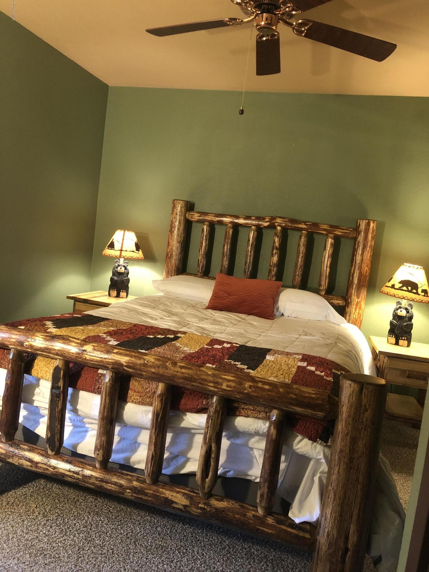 1261 Tanglewood Road Prescott, AZ 86303 - Photo 13 of 36 a bedroom with a bed in it