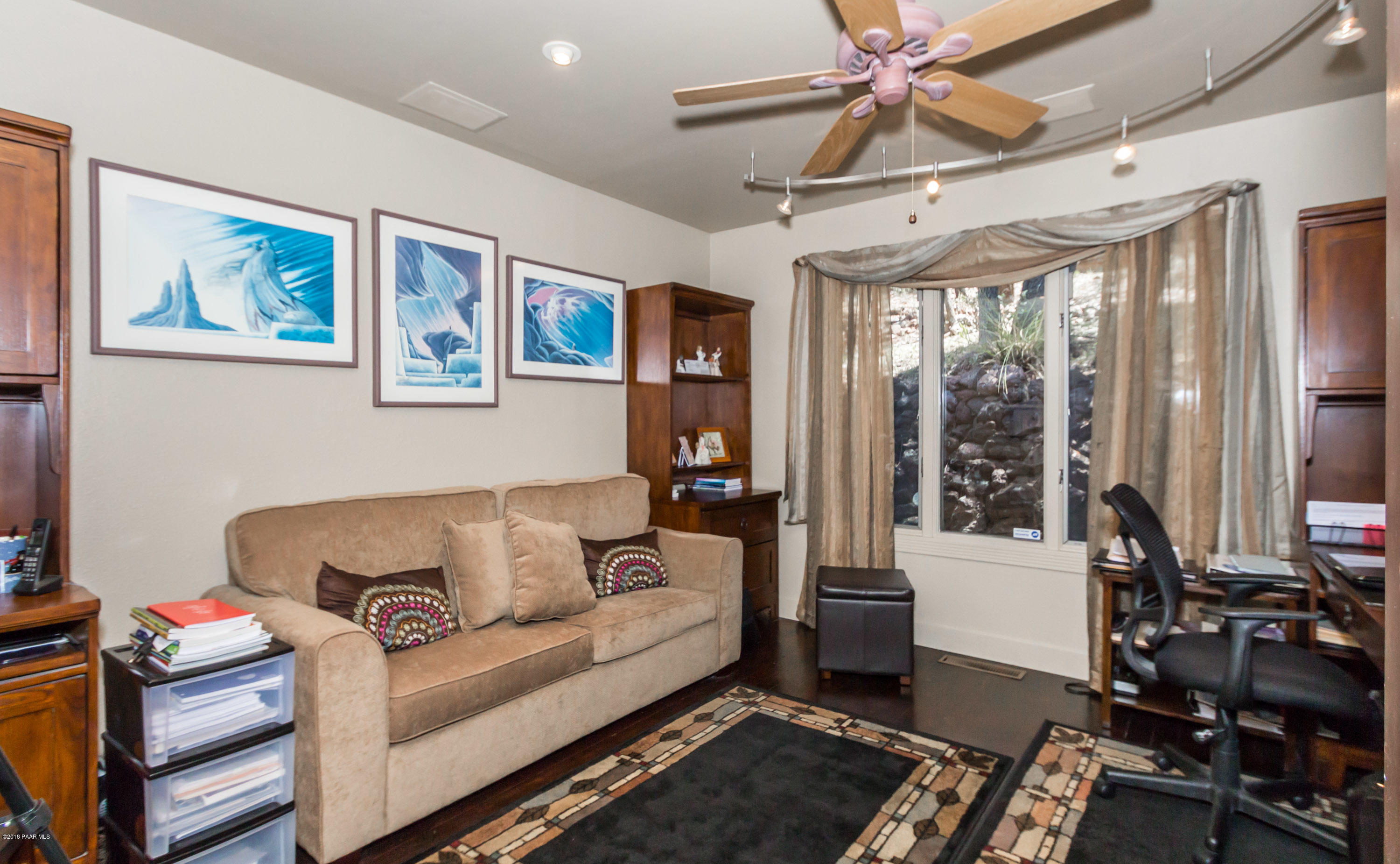 1261 Tanglewood Road Prescott, AZ 86303 - Photo 17 of 36 a living room with furniture and a window