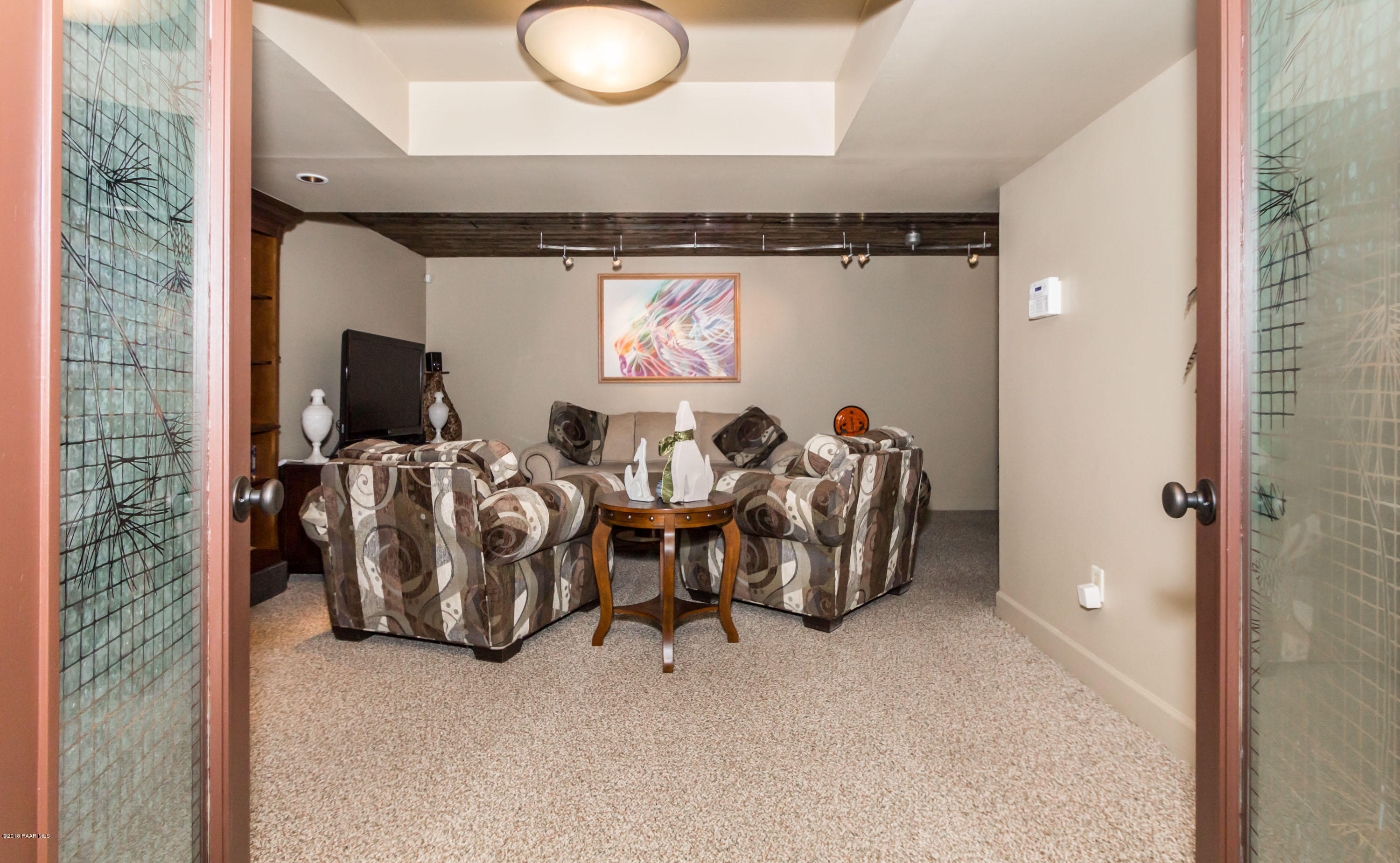 1261 Tanglewood Road Prescott, AZ 86303 - Photo 19 of 36 a view of living room with furniture and a flat screen tv