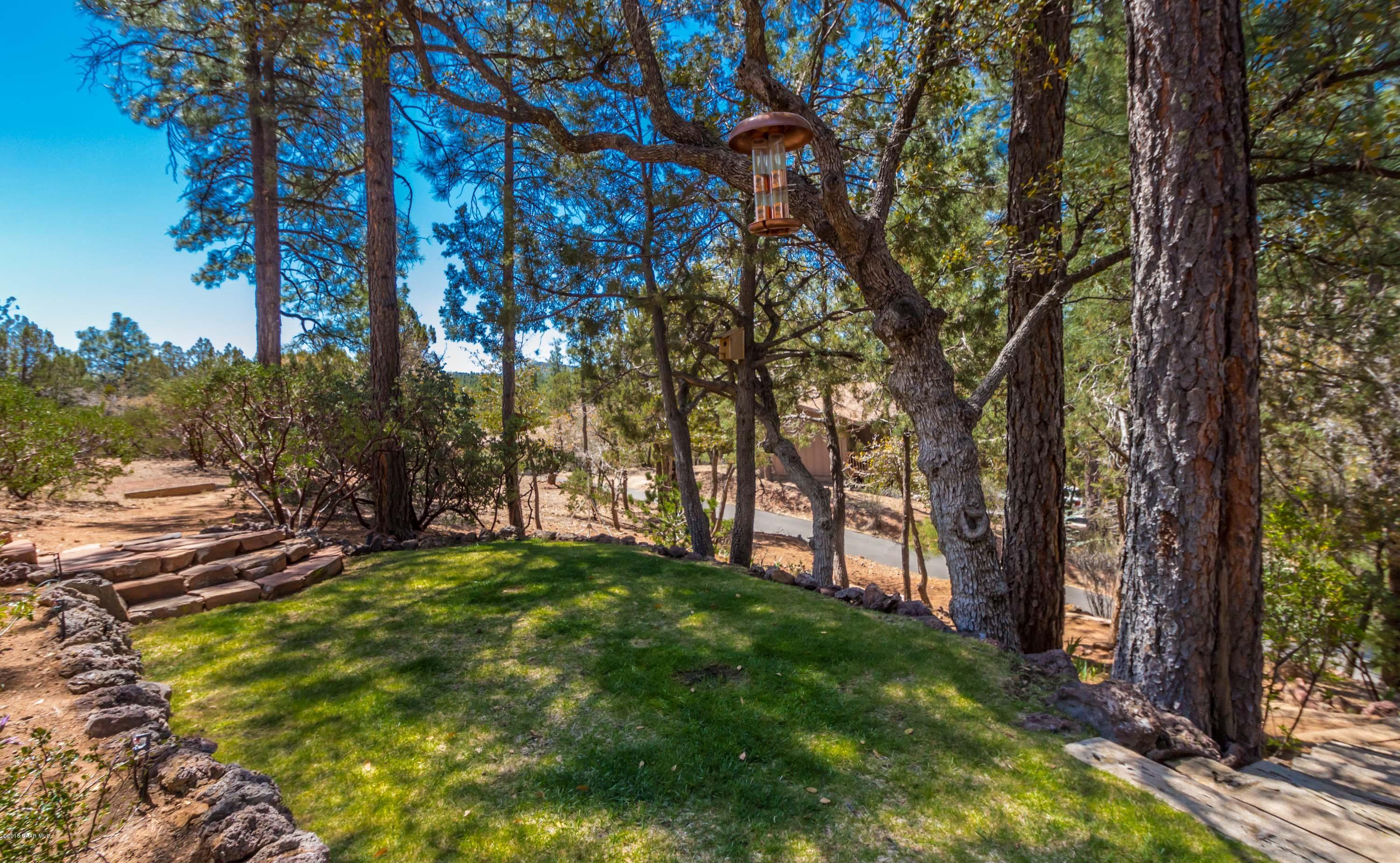 1261 Tanglewood Road Prescott, AZ 86303 - Photo 23 of 36 a view of an outdoor space with yard