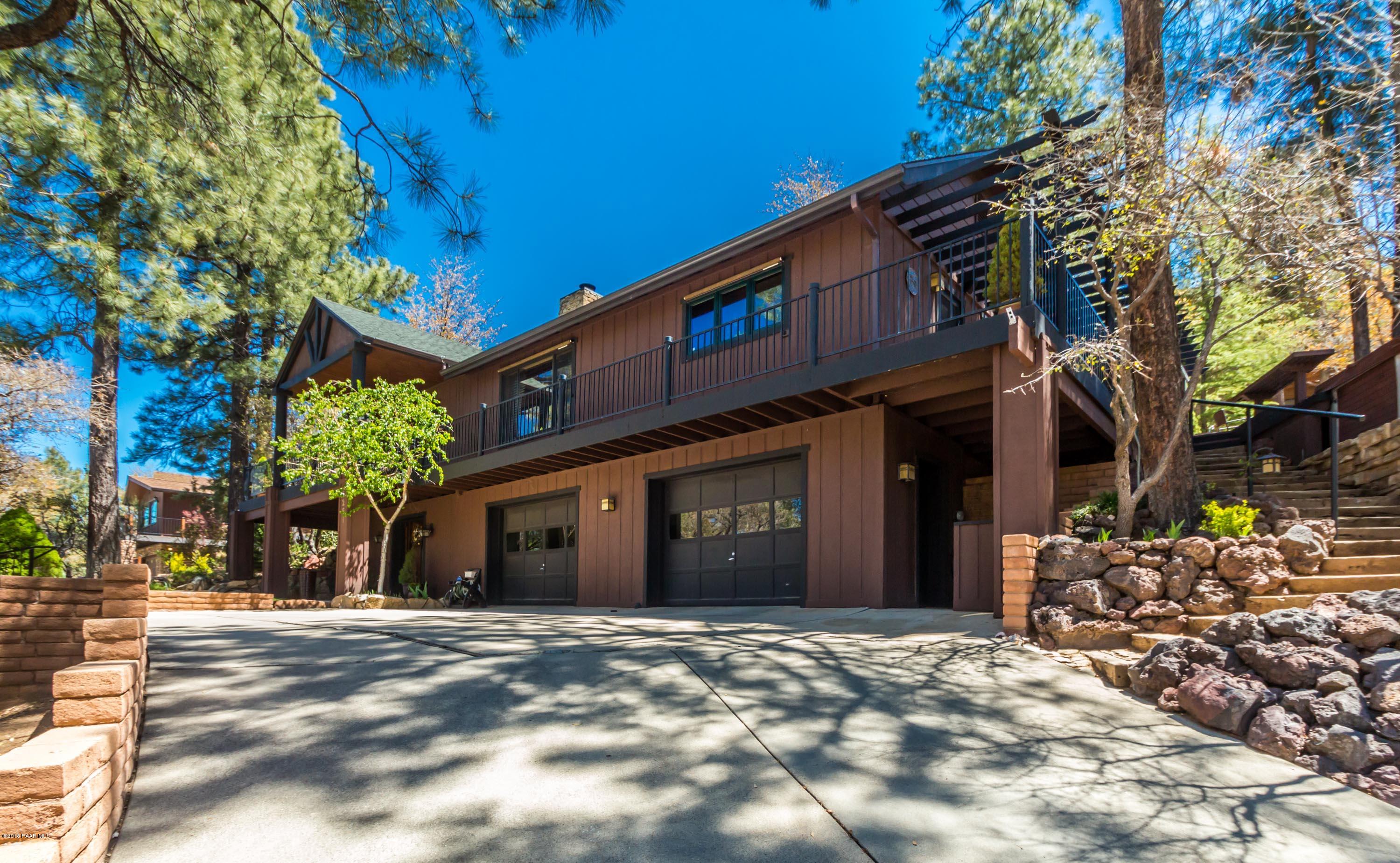 1261 Tanglewood Road Prescott, AZ 86303 - Photo 24 of 36 a view of a house with a yard