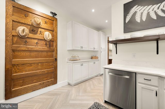 a kitchen with a cabinets and a stove