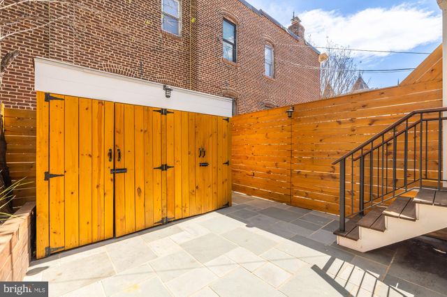 a view of a balcony with door