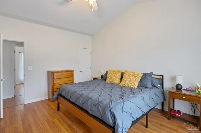 a bedroom with a bed and a closet