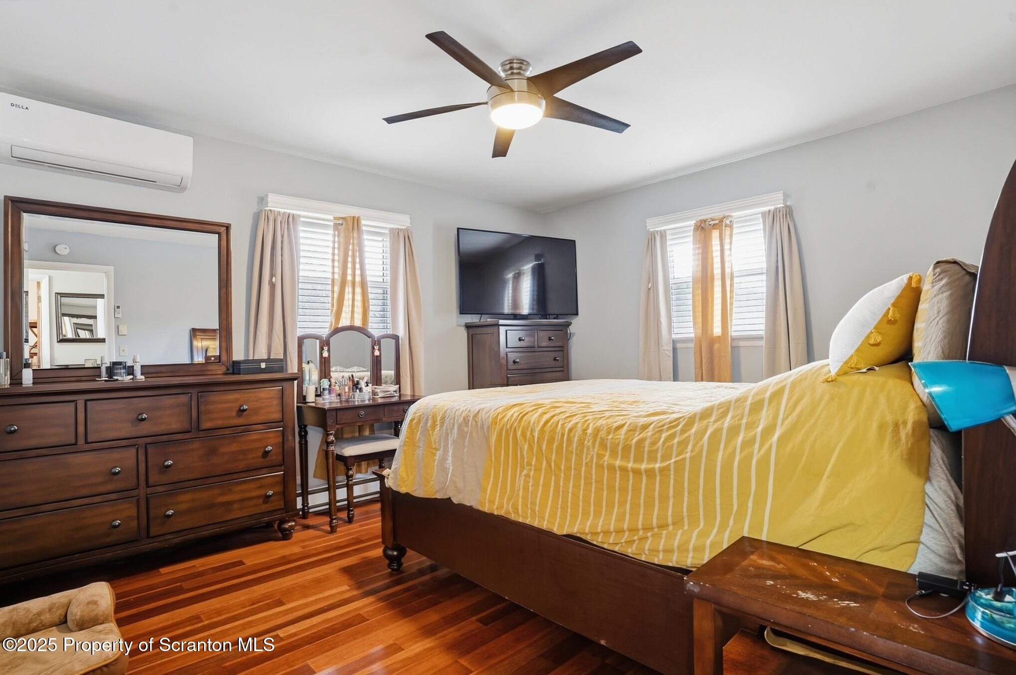 105 Fern Way Clarks Summit, PA 18411 - Photo 16 of 40 a bed room with a bed and a dresser