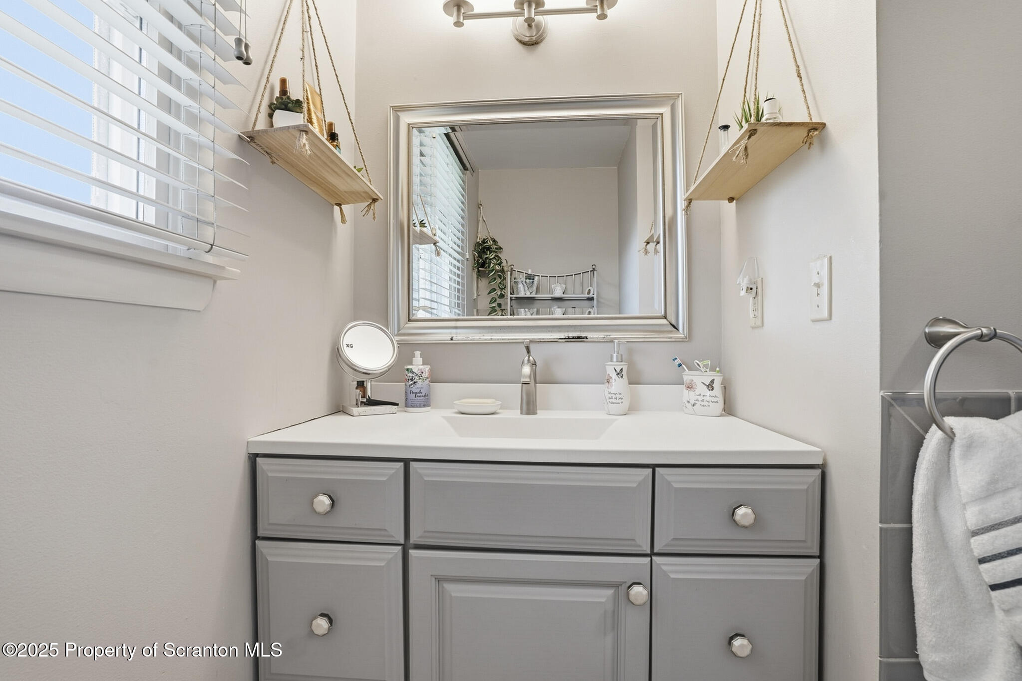 105 Fern Way Clarks Summit, PA 18411 - Photo 21 of 40 a bathroom with a sink and a mirror
