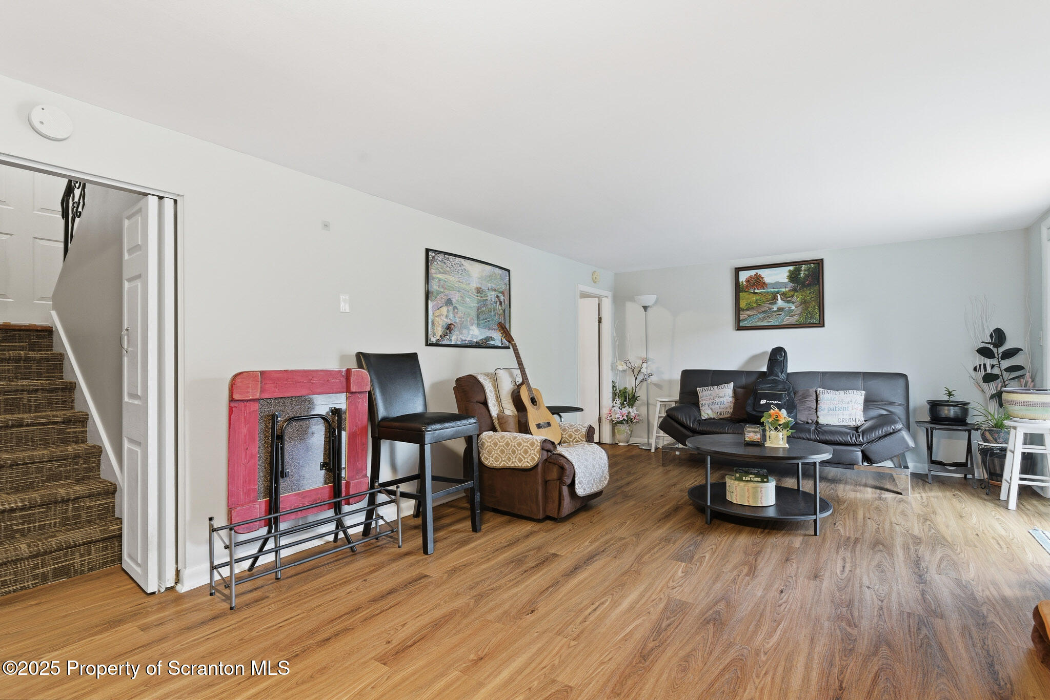105 Fern Way Clarks Summit, PA 18411 - Photo 24 of 40 a living room with furniture and wooden floor