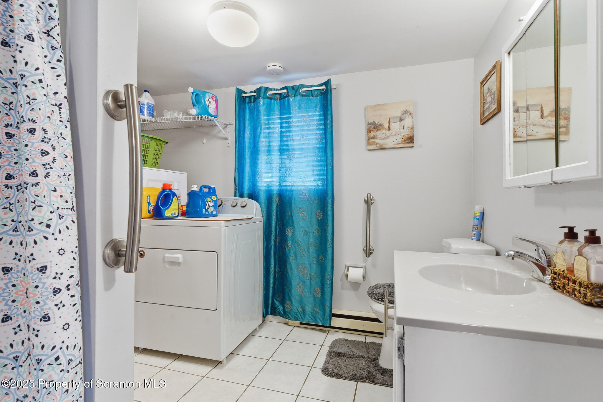 105 Fern Way Clarks Summit, PA 18411 - Photo 29 of 40 a utility room with cabinets washer and dryer