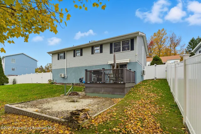 a view of a house with a swimming pool