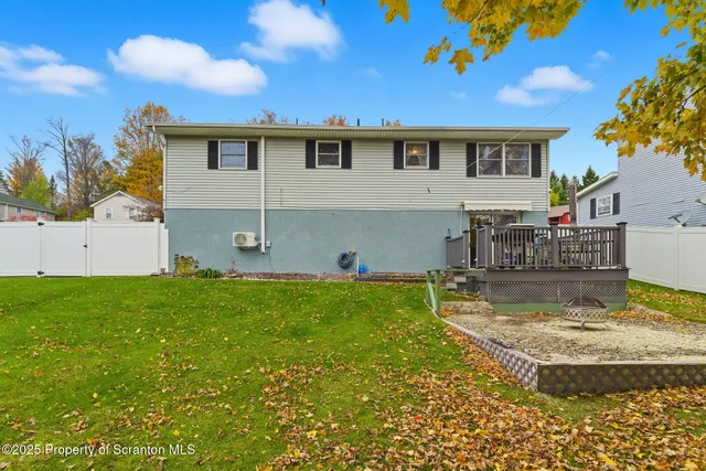 a view of a house with a swimming pool