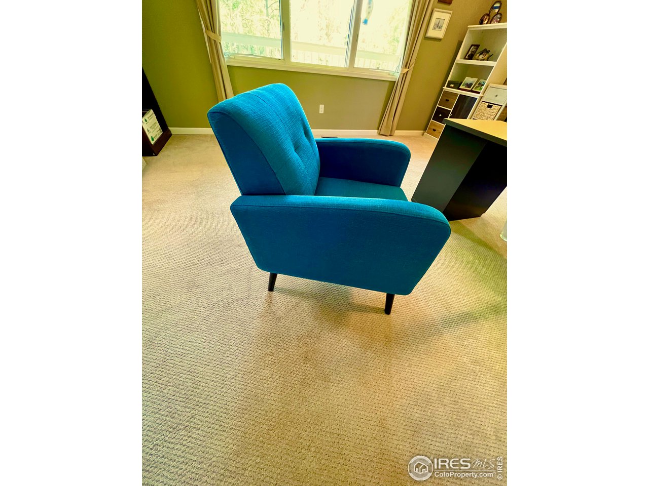 4086 26th Street Boulder, CO 80304 - Photo 19 of 40 A blue chair