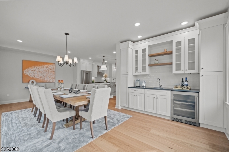 147 Center Avenue, Unit 17 Old Tappan, NJ 07675 - Photo 12 of 48 a large kitchen with a table and chairs