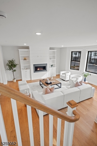 147 Center Avenue, Unit 17 Old Tappan, NJ 07675 - Photo 18 of 48 a living room with furniture and flat screen tv