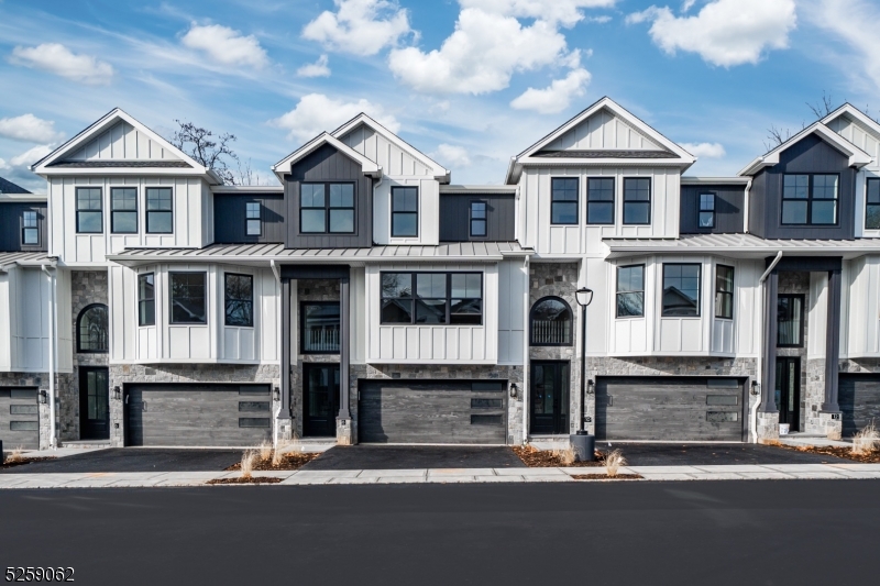 147 Center Avenue, Unit 17 Old Tappan, NJ 07675 - Photo 45 of 48 a front view of a house with a yard