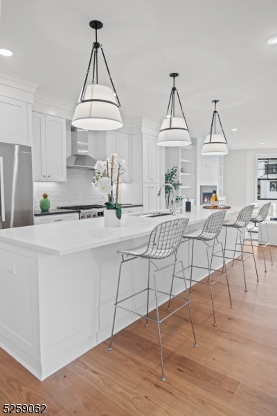 147 Center Avenue, Unit 17 Old Tappan, NJ 07675 - Photo 10 of 48 a living room with furniture a table and chairs