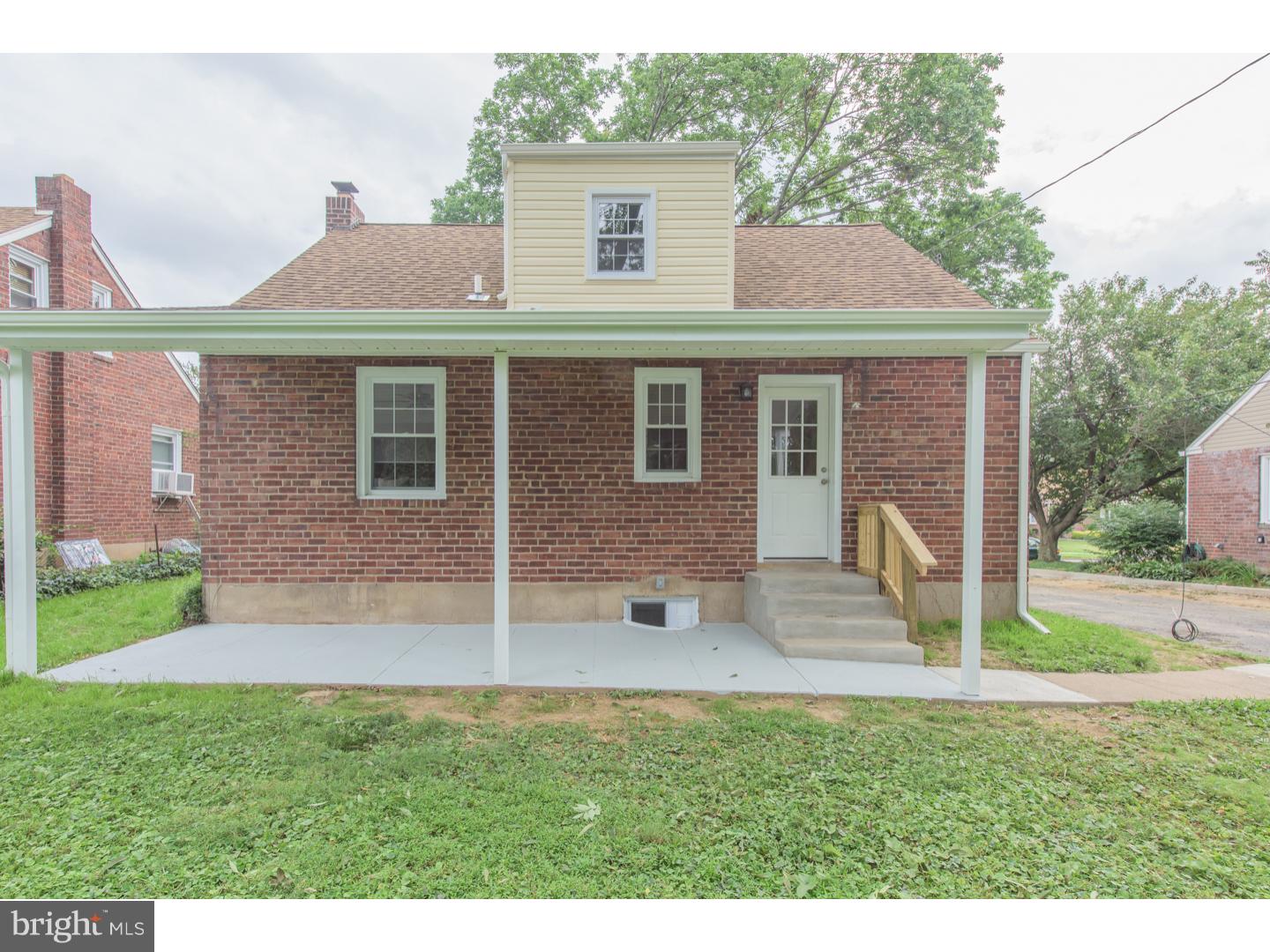 2224 Avon Road Ardmore, PA 19003 - Photo 22 of 23 a front view of a house with garden
