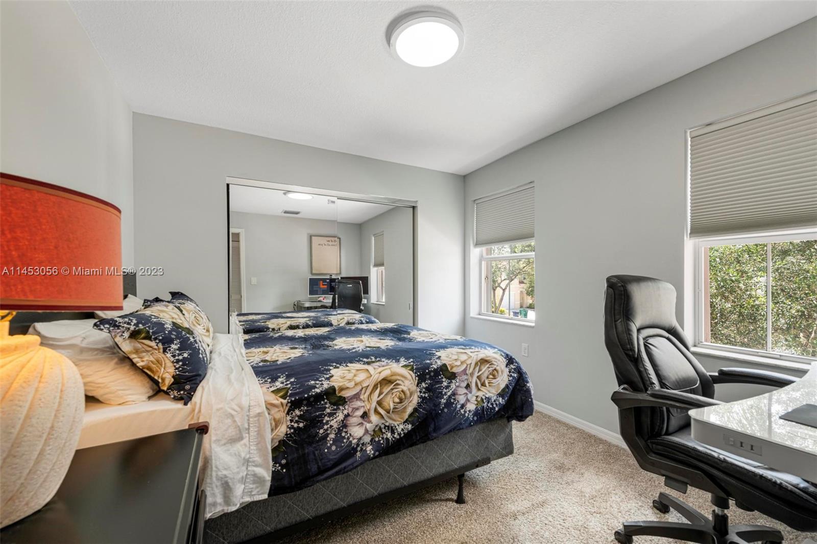 4175 Tree Top Road Cooper City, FL 33026 - Photo 25 of 39 a bedroom with furniture and a window