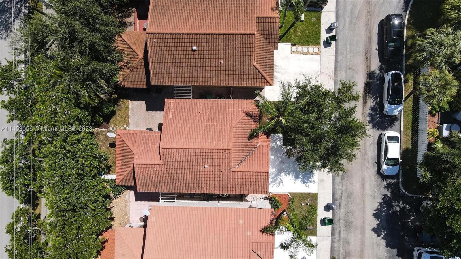 4175 Tree Top Road Cooper City, FL 33026 - Photo 31 of 39 an aerial view of residential houses with outdoor space