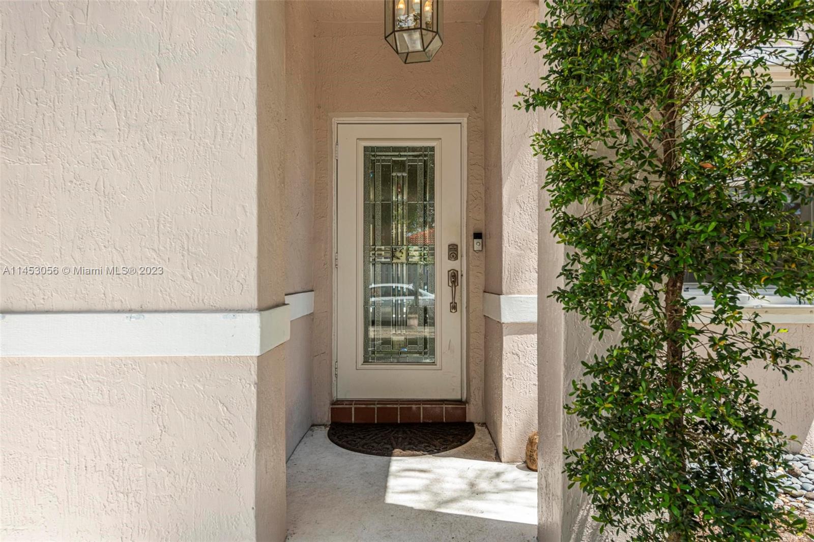 4175 Tree Top Road Cooper City, FL 33026 - Photo 7 of 39 a view of a entryway of the house