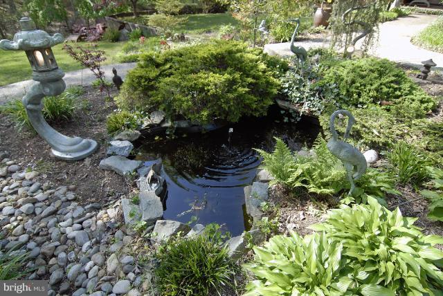 15800 Bond Mill Road Laurel, MD 20707 - Photo 24 of 30 Front Pond with Stone Walkway