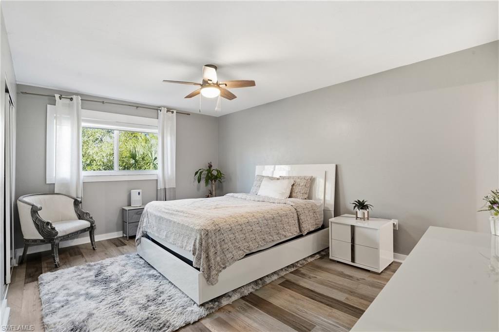 2828 Jackson Street, Unit H6 Fort Myers, FL 33901 - Photo 13 of 27 a bedroom with a bed and window