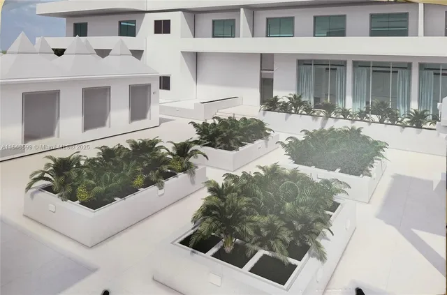 a view of an chairs and table in a room