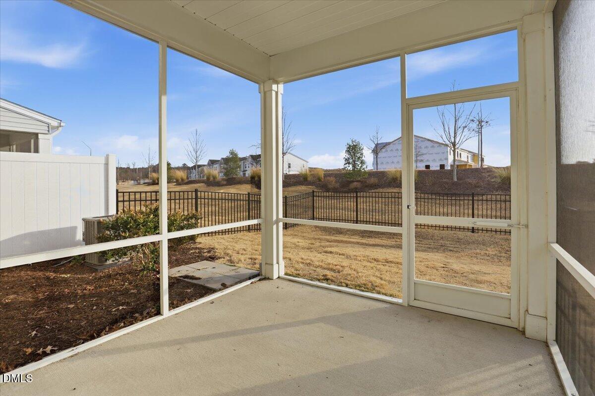 5052 Tura Street Raleigh, NC 27610 - Photo 25 of 47 a view of an empty room with a window