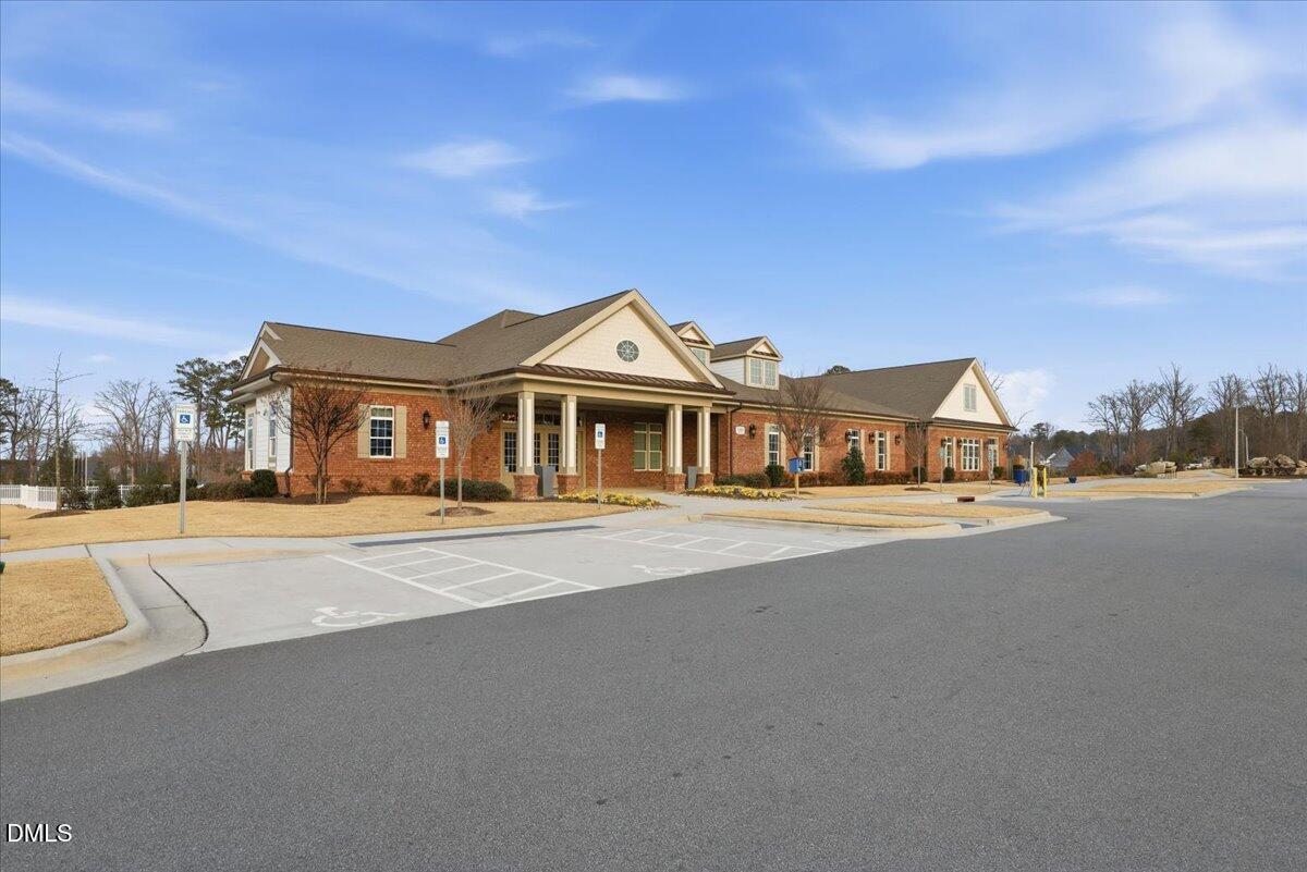5052 Tura Street Raleigh, NC 27610 - Photo 28 of 47 a front view of a house with a ocean view