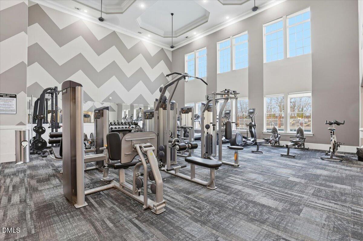 5052 Tura Street Raleigh, NC 27610 - Photo 32 of 47 a view of a room with lots of gym equipment