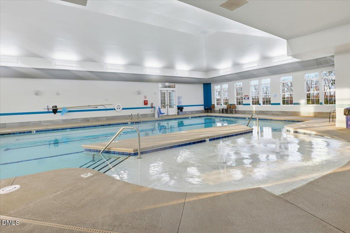 5052 Tura Street Raleigh, NC 27610 - Photo 33 of 47 a view of a kitchen with kitchen island and a sink