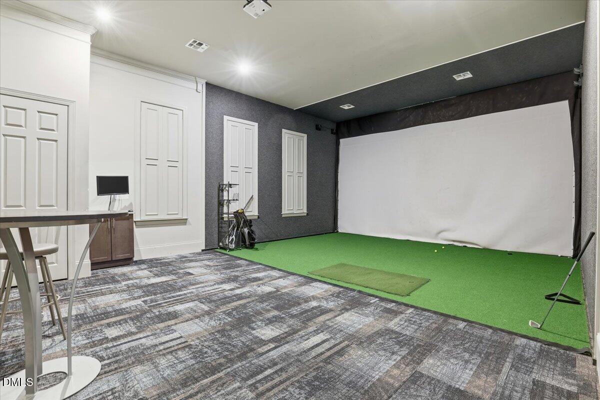 5052 Tura Street Raleigh, NC 27610 - Photo 34 of 47 a view of an empty room with kitchen and a window