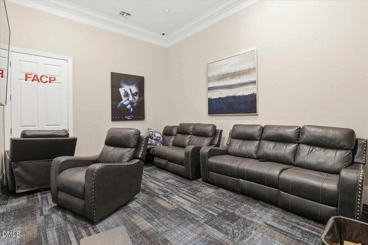 5052 Tura Street Raleigh, NC 27610 - Photo 36 of 47 a living room with furniture and a window