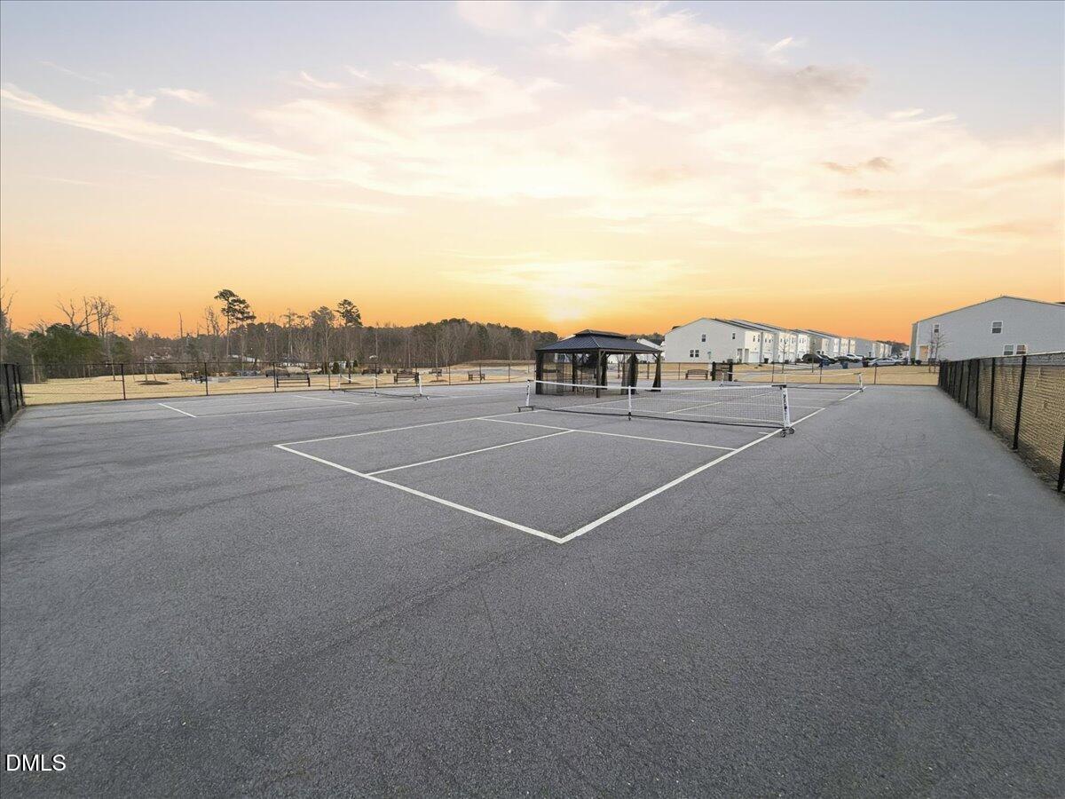 5052 Tura Street Raleigh, NC 27610 - Photo 43 of 47 a view of a tennis court