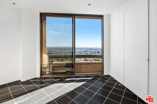 a view of a black and white floor to ceiling window