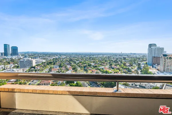 a view of a city from a balcony