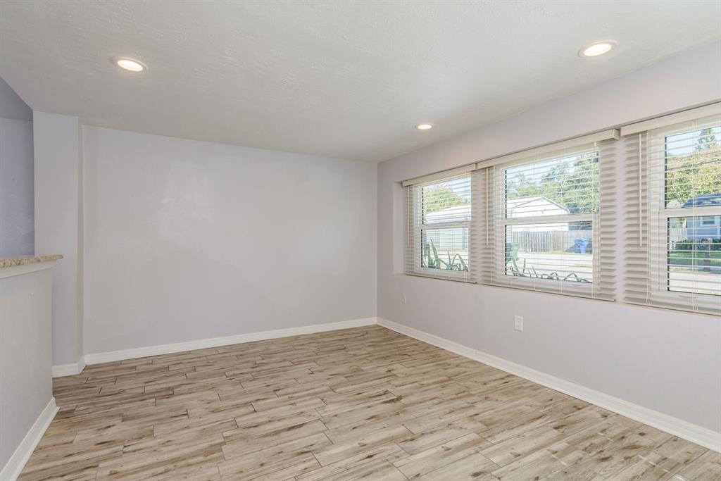 819 10th Street Southwest, Unit A Largo, FL 33770 - Photo 12 of 29 a view of empty room with wooden floor and fan