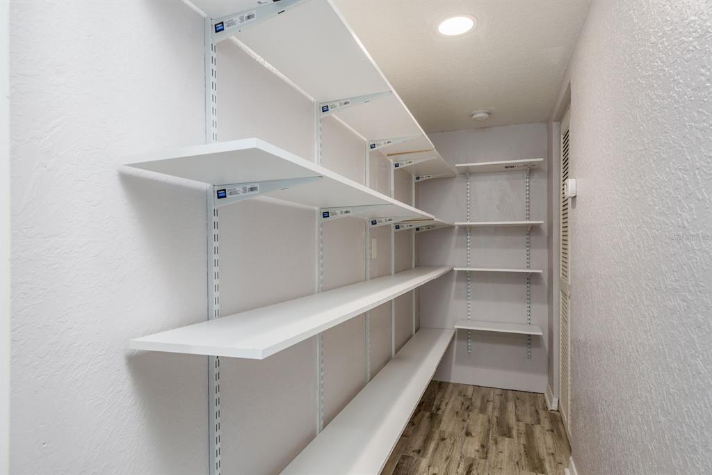819 10th Street Southwest, Unit A Largo, FL 33770 - Photo 25 of 29 a view of a hallway with white walls