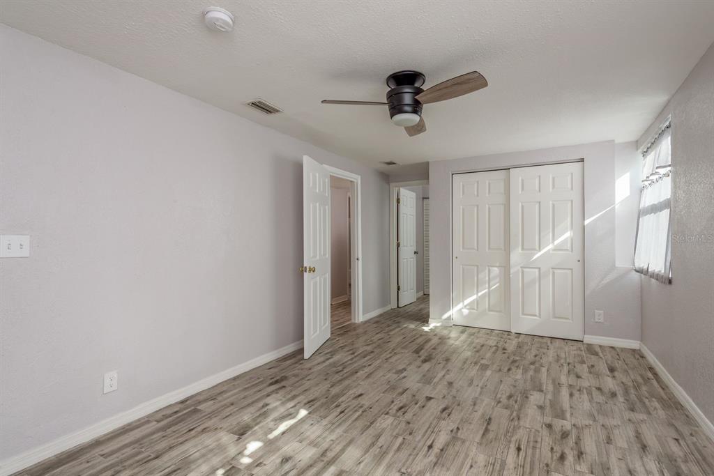 819 10th Street Southwest, Unit A Largo, FL 33770 - Photo 27 of 29 a view of entryway with wooden floor
