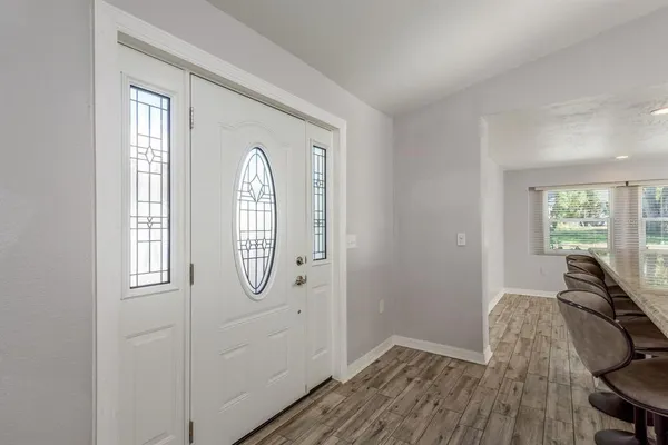 a view of livingroom with furniture wooden floor and window