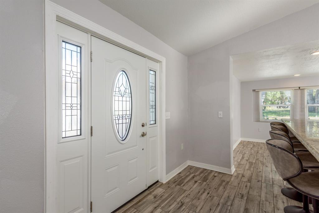 819 10th Street Southwest, Unit A Largo, FL 33770 - Photo 10 of 29 a view of livingroom with furniture wooden floor and window