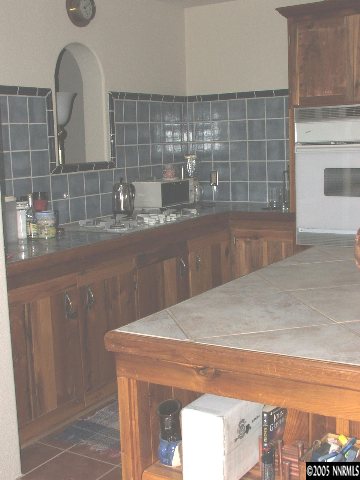 13990 North Red Rock Road Reno, NV 89508 - Photo 7 of 9 a kitchen with a sink and a vanity