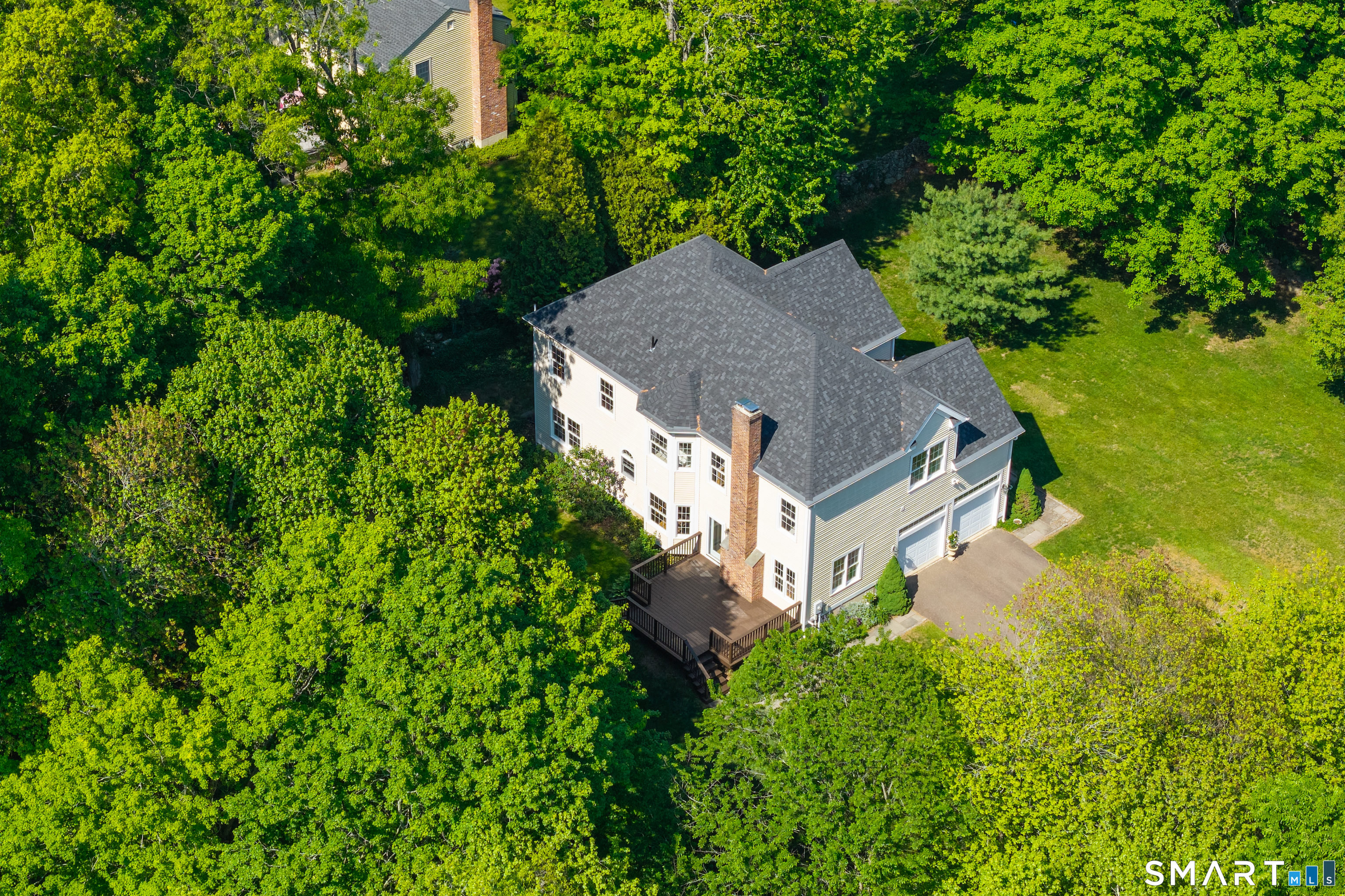 474 State Street Guilford, CT 06437 - Photo 34 of 40 an aerial view of a house with a yard basket ball court and outdoor seating