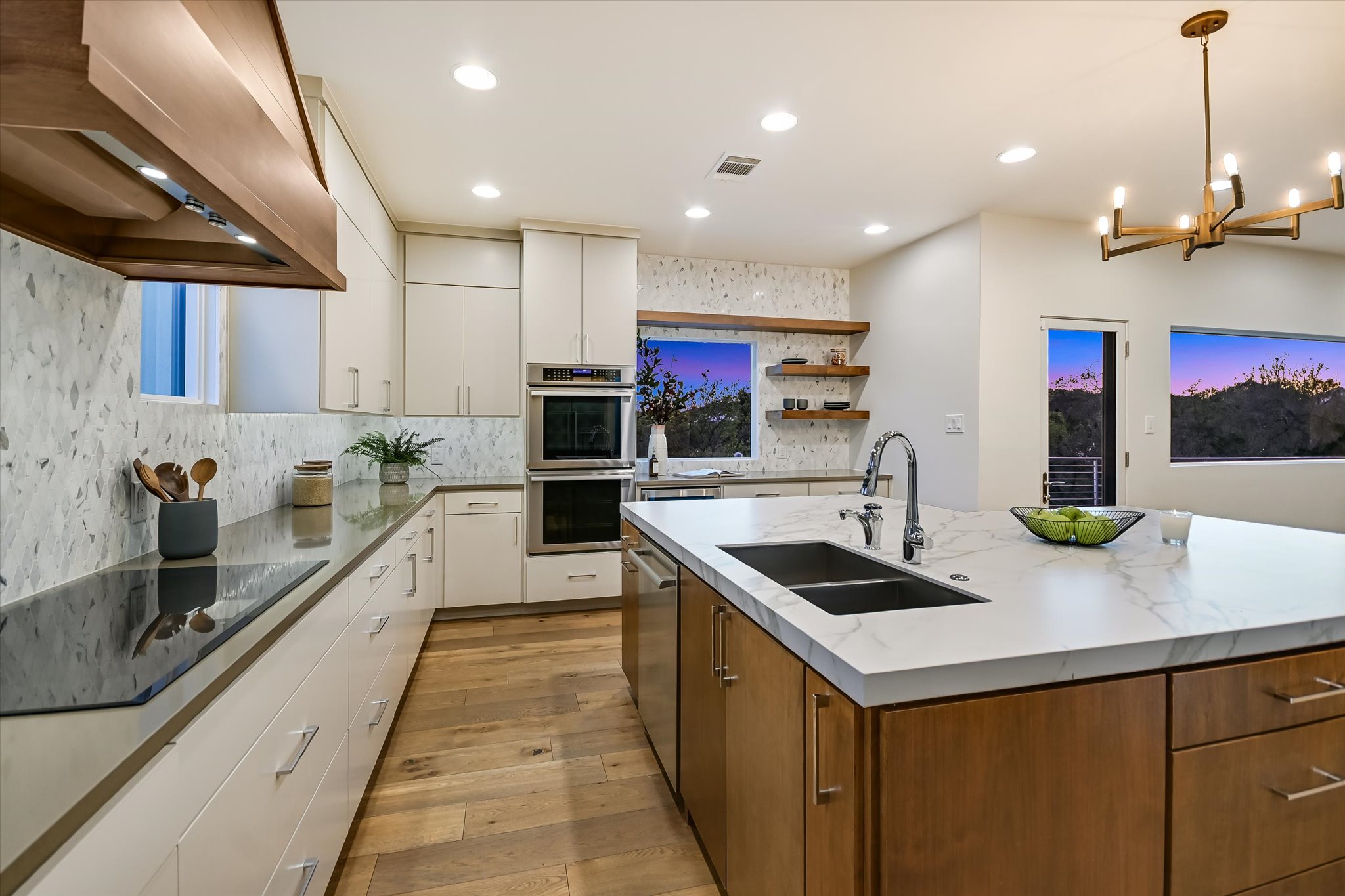 14 Rob Roy Road Austin, TX 78746 - Photo 14 of 40 a kitchen with stainless steel appliances granite countertop a sink and a refrigerator