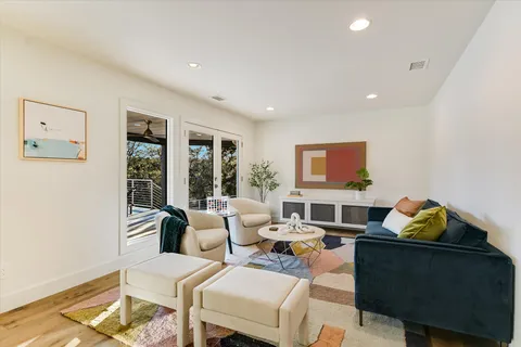 a living room with furniture and a window